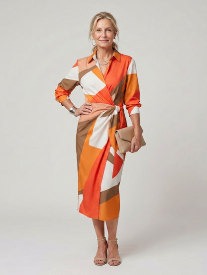 Printed Long Sleeve Twist Wrap Midi Dress in Orange